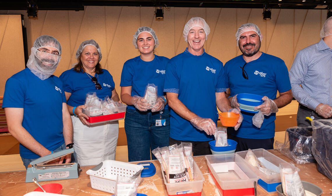 Rise Against Hunger Meal Packing Event at NYHQ with Rady Johnson