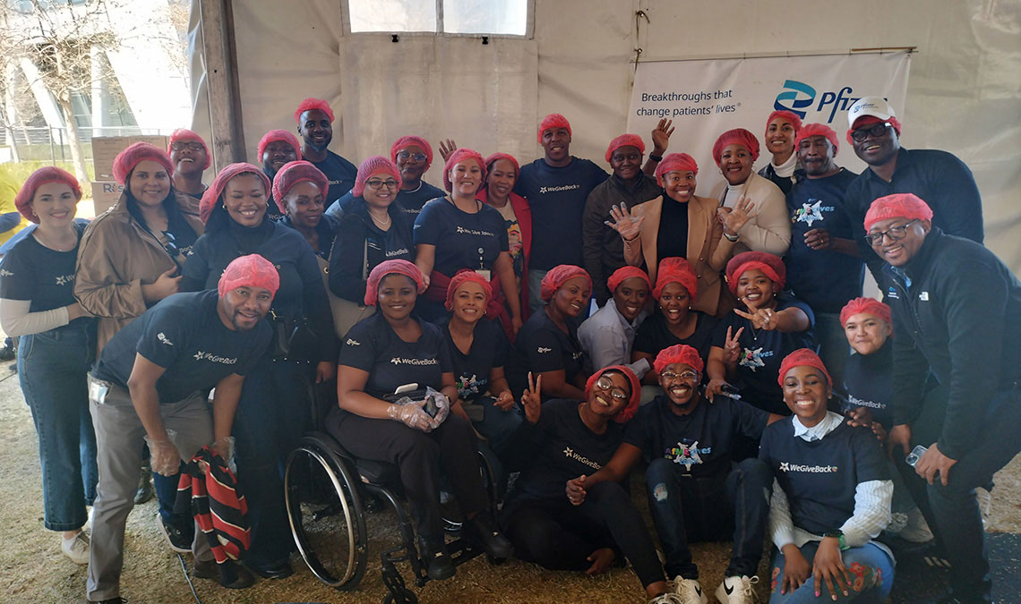 pfizer colleagues - volunteers taking a photo for 175 days of good