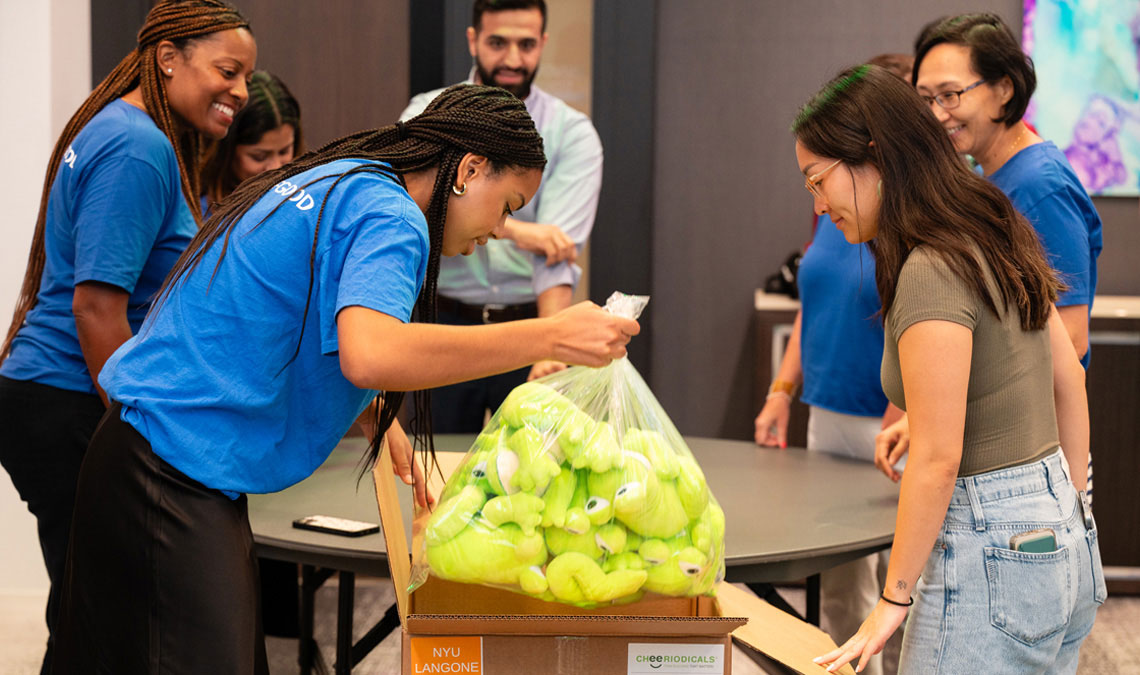 group photo new york pfizer offices volunteers