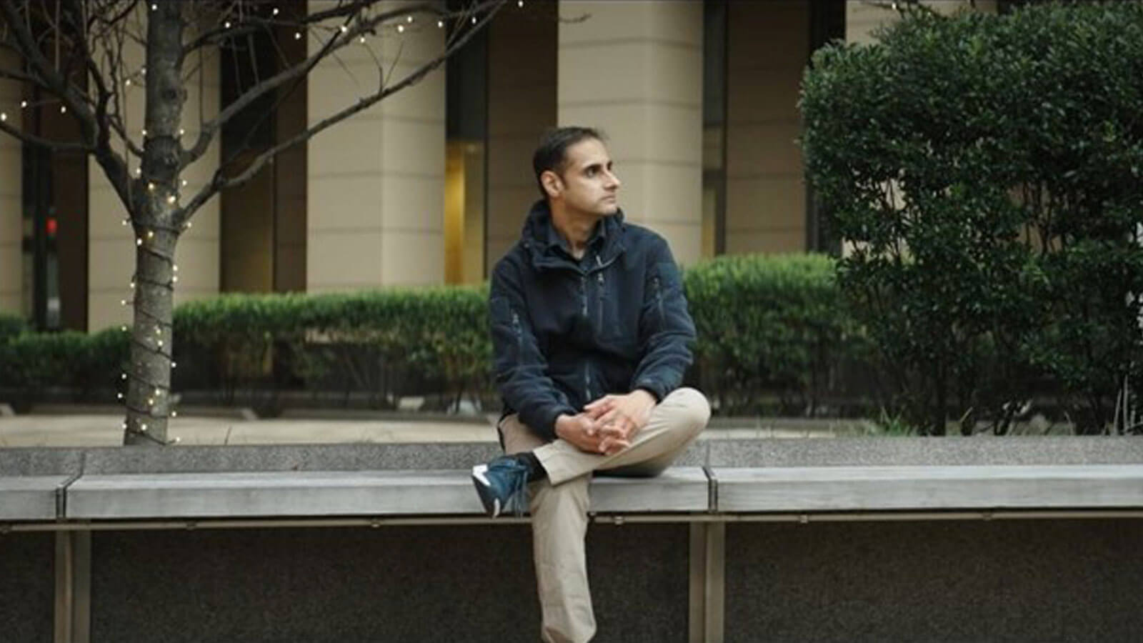 Jaimeen sitting on a bench