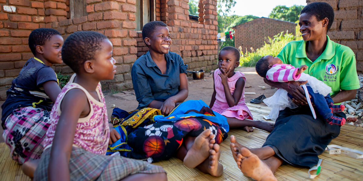 healthcare worker overseeing children