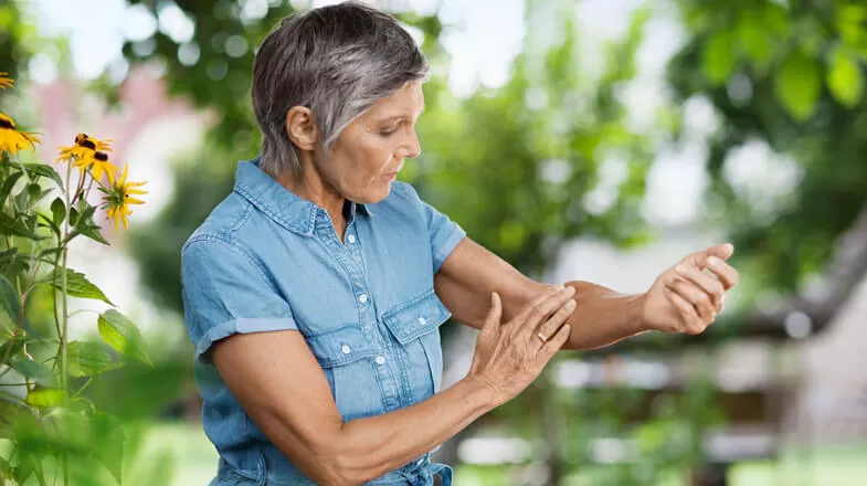 Woman checking for ticks thumbnail