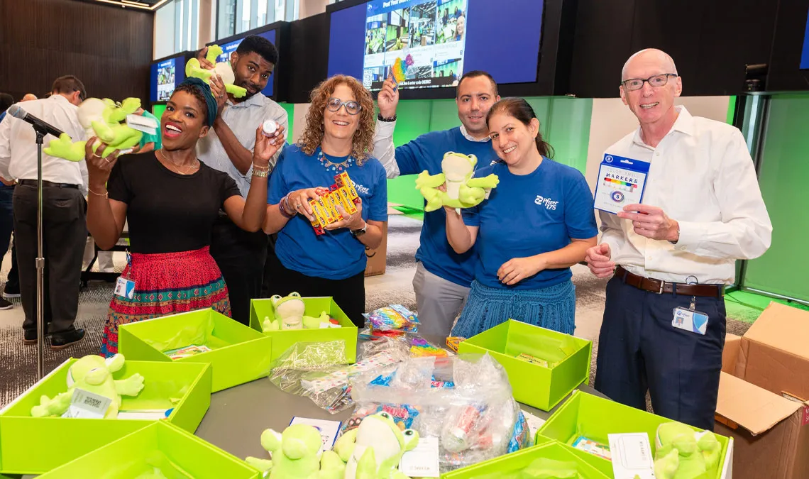 group photo new york pfizer offices volunteers