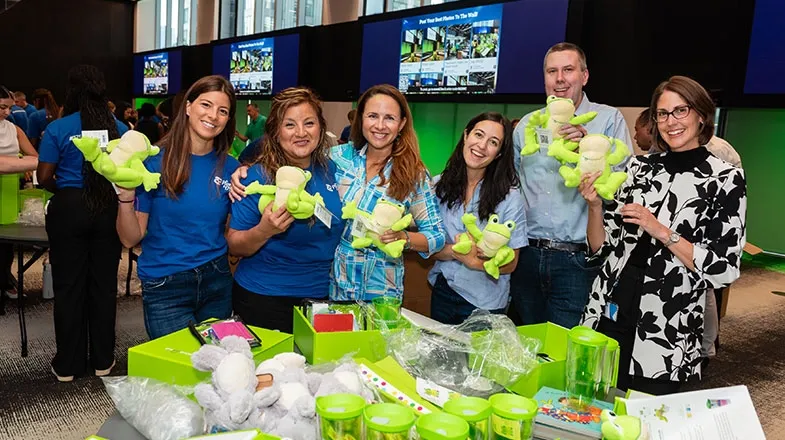 Pfizer colleagues pack kits at Pfizer New York headquarters for 175 Days of Good