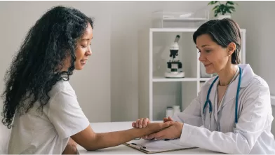 Doctor and patient talking