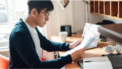 Man reading papers