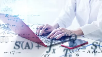 Close up typing on a laptop