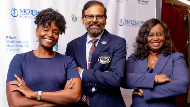 Three People folding arms and smiling