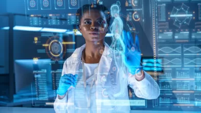 A young African - American doctor works on HUD or graphic display in front of her, we see her from the waist up in a modern laboratory thumbnail