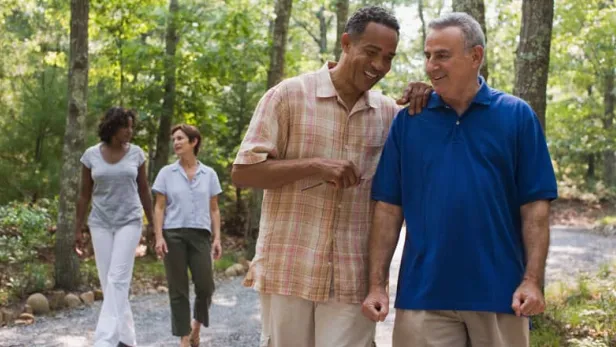 Friends walking in forest thumbnail