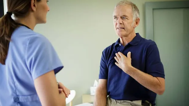 Elderly man speaking with healthcare professional thumbnail