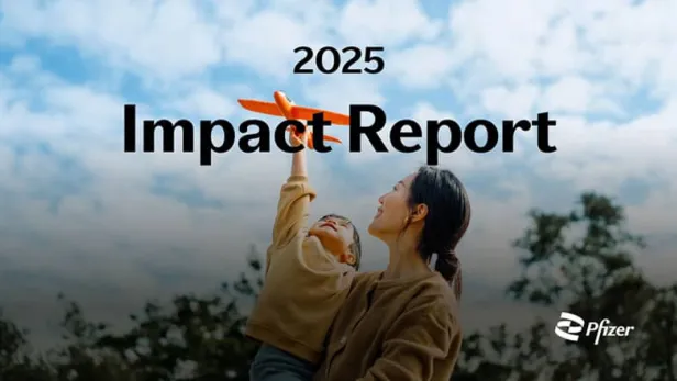 Photograph of a woman lifting a child holding a toy plane against a cloudy sky thumbnail